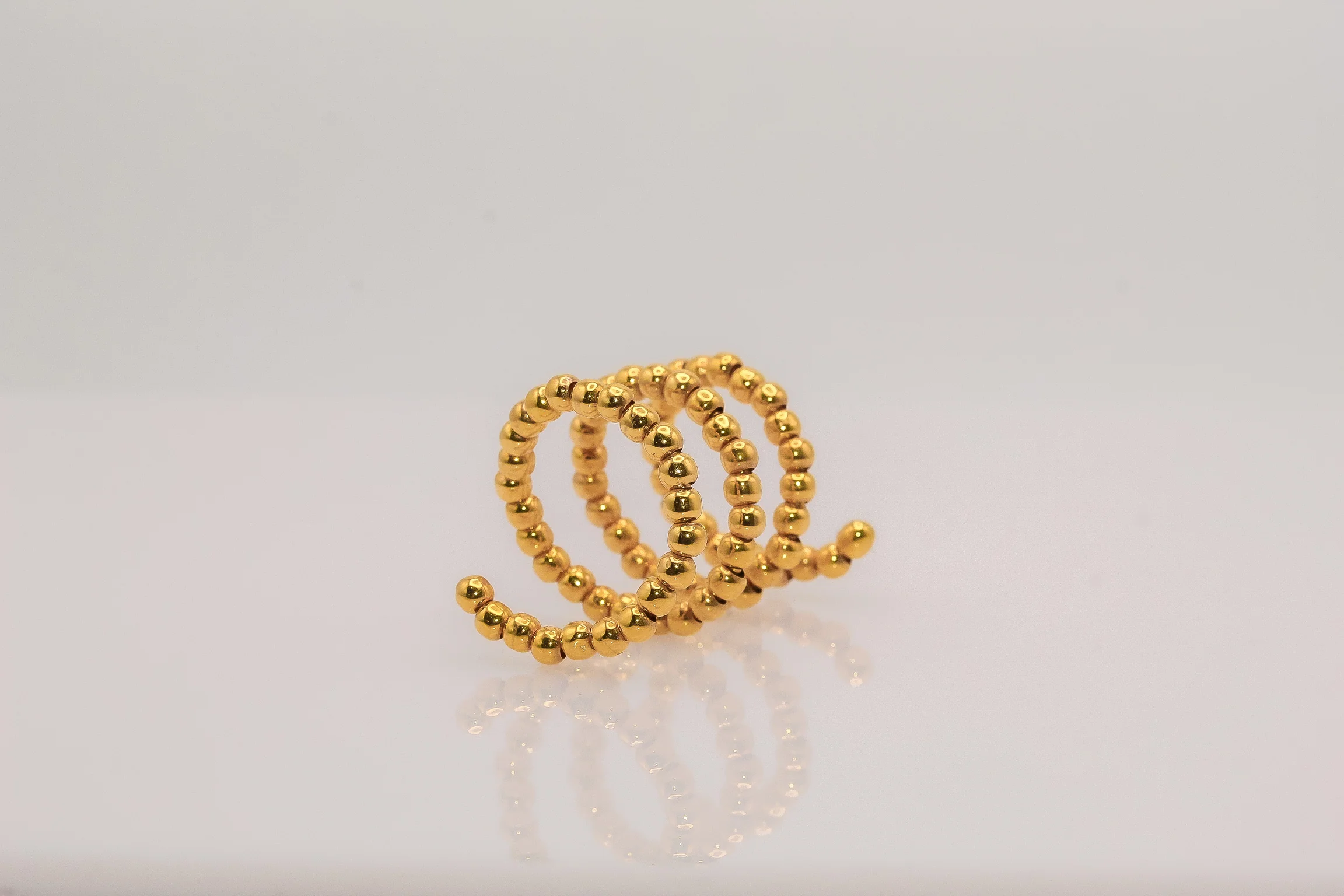 21K Gold Beaded Twist Ring