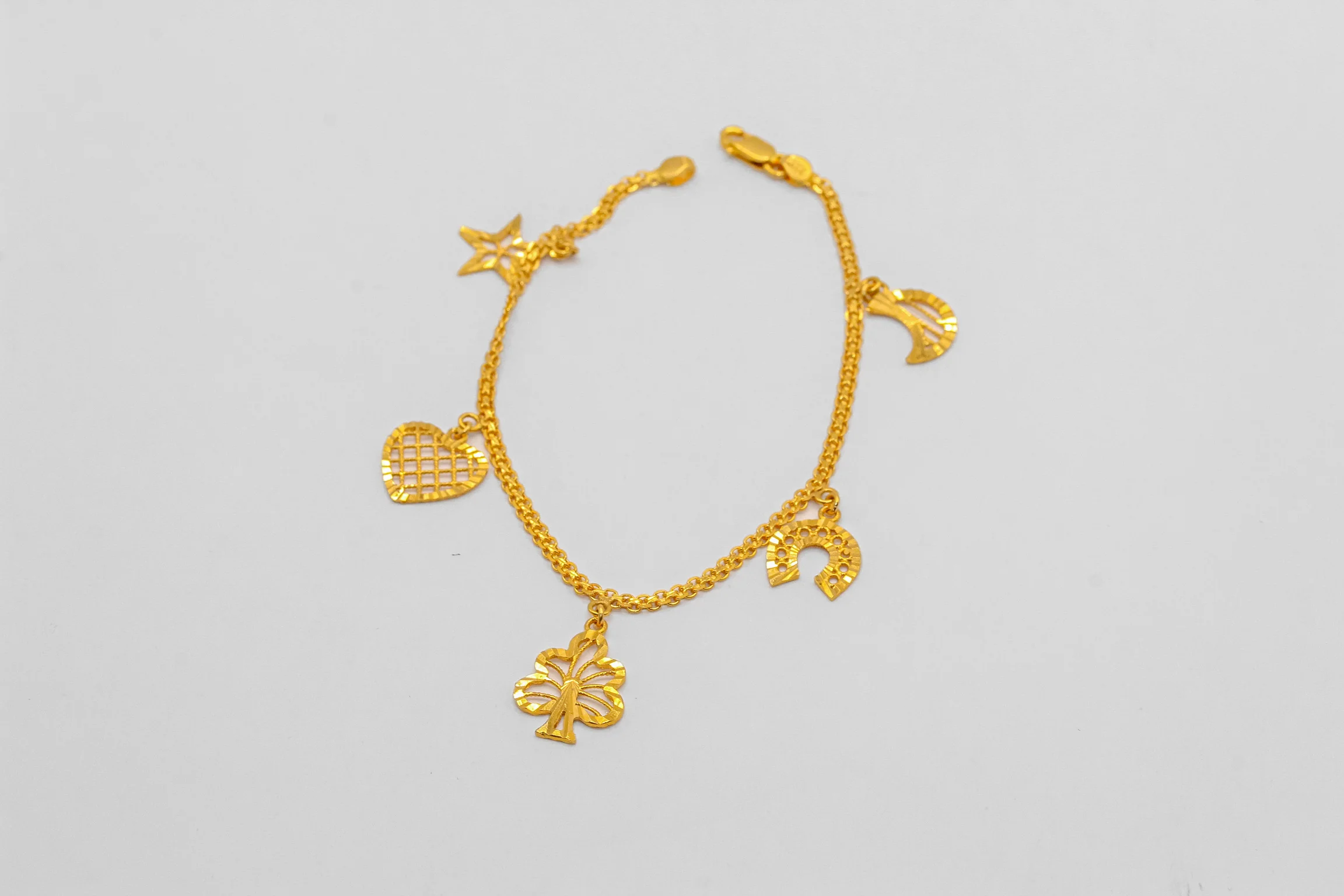 21K Gold Multi Charm Bracelet