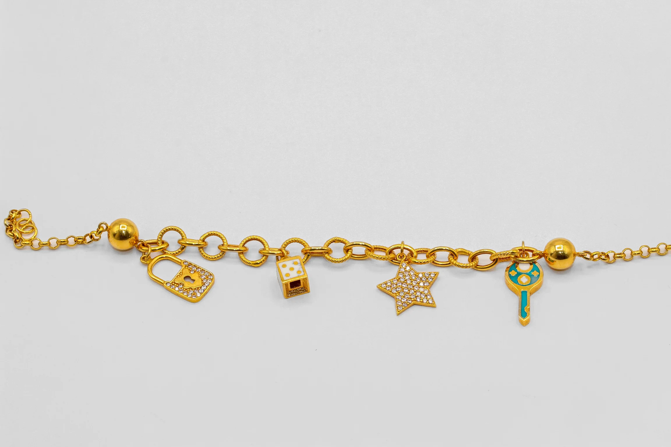 21K Gold Multi Charm Bracelet - Image 2